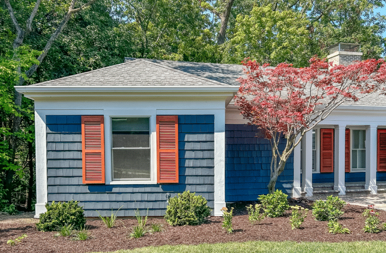 vixen hill red shutters on blue siding